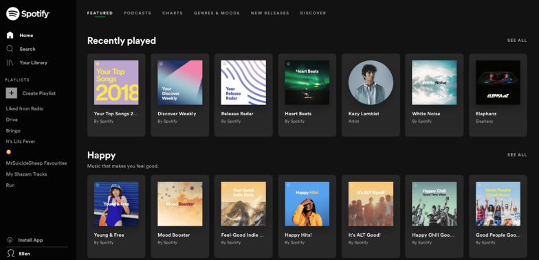 Spotify 页面的屏幕截图，在黑暗模式下，专辑和艺术家图像是彩色的，文本是白色的。