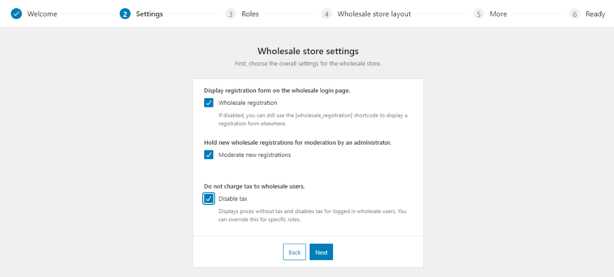 ログイン ページ、新規登録、免税ステータスの設定を示す WooCommerce Wholesale Pro セットアップ ウィザード。