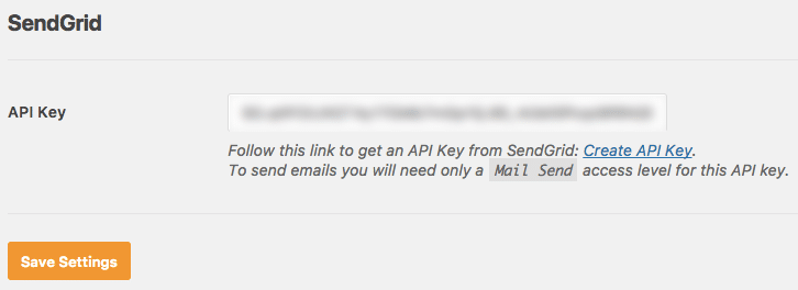 Pegue la clave API de SendGrid y guarde la configuración